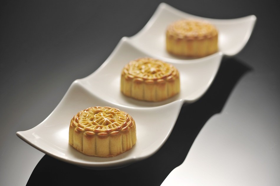 three little sweet cakes called 'mooncake'