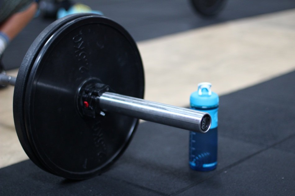 dumbbell and bottle of water