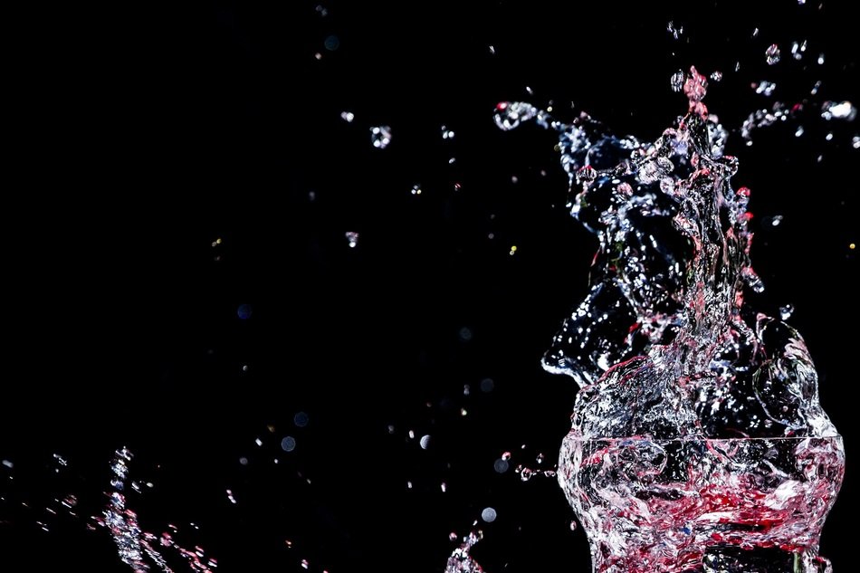 splashes of champagne on a black background