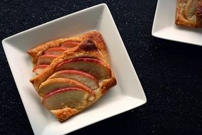 Baked Apple slices in white plate