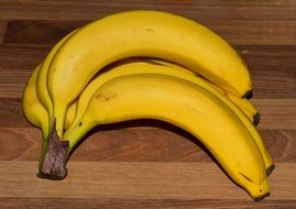 bananas on a wooden board