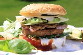 veggie burger with lettuce and avocado