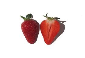 Isolated Half fruit strawberry