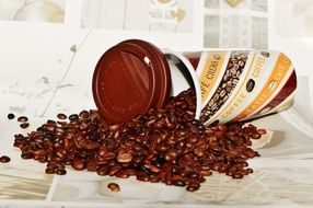 scattered coffee beans on the table