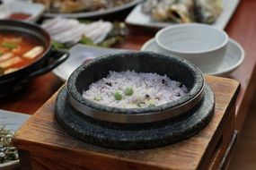 traditional korean food in stone dishes
