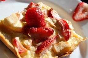 dessert with strawberries on a white plate