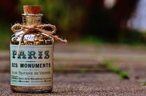small glass bottle with cork paris