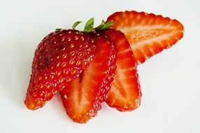 cut strawberry on a white background