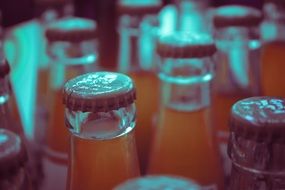 sweet drinks in glass bottles close up