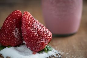 closeup picture of ripe strawberries with sugar