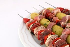 shashlik on white dish