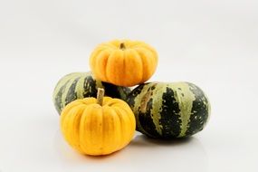 isolated green and yellow pumpkins