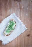 sandwich with soft cheese and herbs
