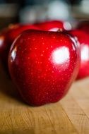 ed Apples on wooden table