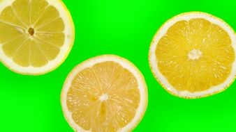 green background with lemon slices