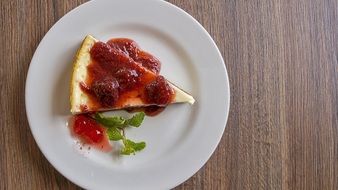 cake with jam on a white plate