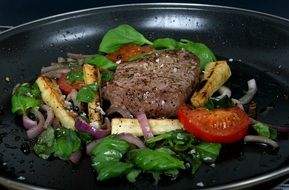 roasted beef with colorful vegetables