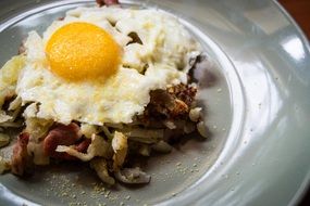 Hash Eggs with Potato on plate
