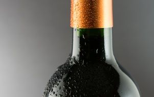 Glass bottle with the wine inside