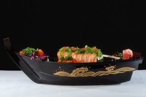 sushi boat on a white table