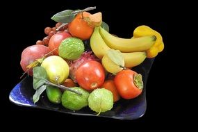 Bowl of different sweet tasty healthy fruits