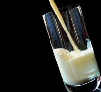 milk in a transparent glass