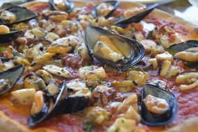 pizza with mussels close-up