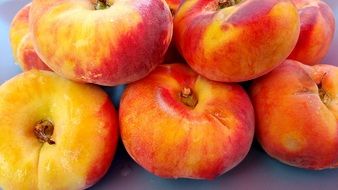 pile of red and yellow Peaches