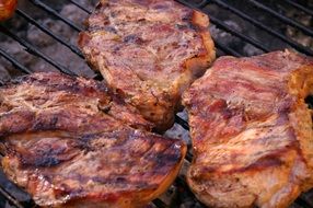 closeup picture of grilled meat steaks