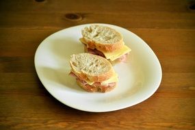 two little sausage and cheese sandwiches