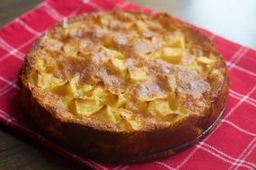 sweet baked apple pie on the table-napkin