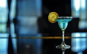 blue cocktail in the glass