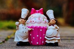 toy pastry-cooks and huge cupcake