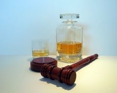 pitcher with whisky and hammer