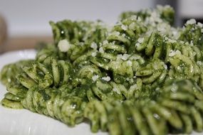 green pasta on a plate