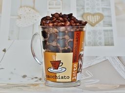 Glass Coffee Cup full of Coffee Beans