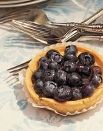 blueberry pie on the table