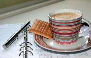 cup of coffee with cookie