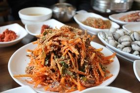 salad with korean carrots and shellfish