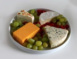 cheese plate with grapes