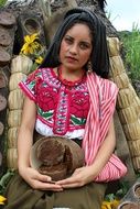 indian woman sitting with a cat