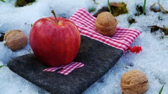 Apple and Nuts on Snow