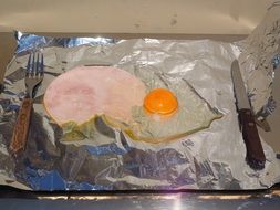 scrambled eggs on foil
