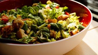 green salad in a large bowl close-up