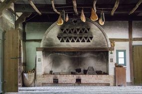 stone stove on wood for cooking