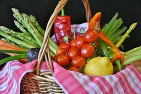 bright summer vegetables in a wicker basket