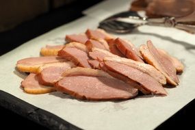 sliced Smoked Duck Meat on board