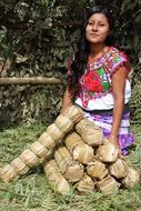 mexican young woman on green grass