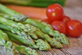 green asparagus and cherry tomatoes close up