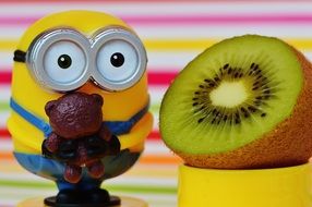 Funny Minion with ripe Kiwi